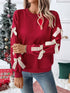 Red Christmas sweater with bows, round neck, front view