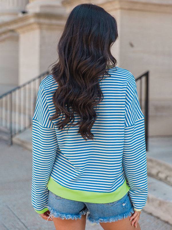 Back view of blue pinstripe pullover with green hem