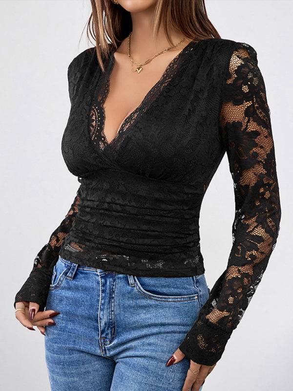 Black lace long sleeve top paired with jeans