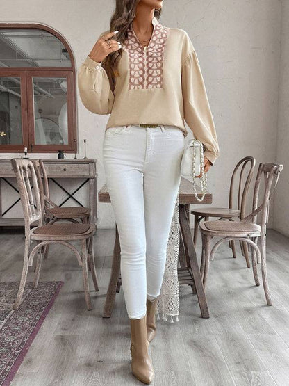 Full view of ethnic style printed shirt with white pants