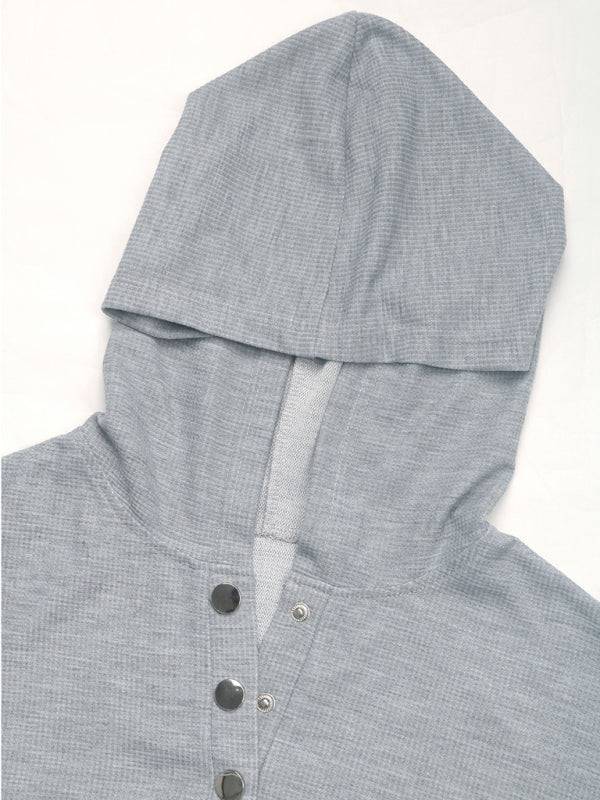 Close-up of gray hooded sweatshirt with buttons