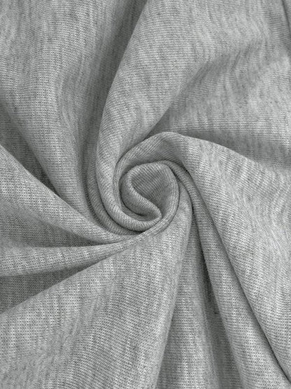 Close-up of gray sweater fabric texture