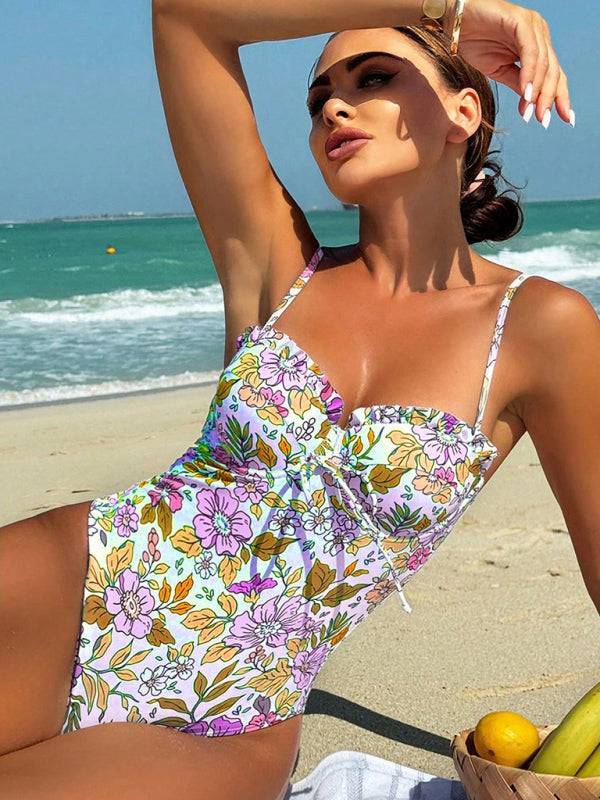 Floral one-piece swimsuit with bowknot on beach