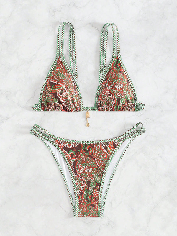 Orange paisley bikini bottom with strappy design