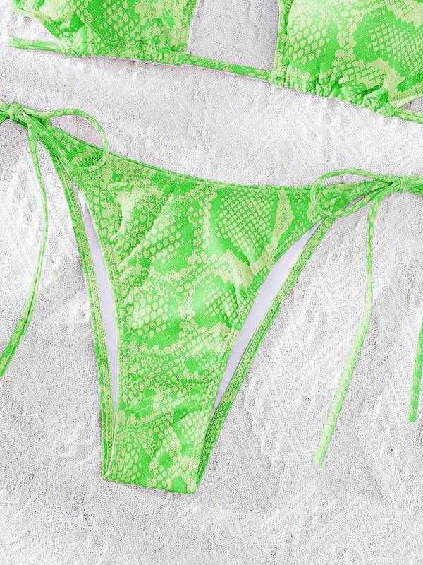 Close-up of green snakeskin bikini bottom