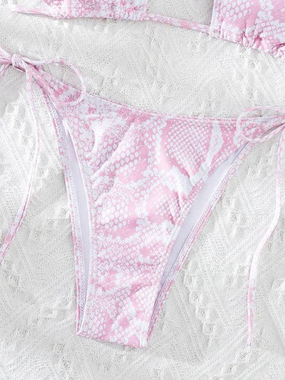 Close-up of pink snakeskin bikini bottom