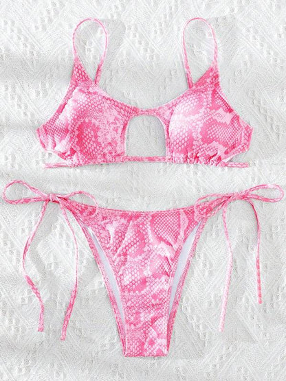 Bright pink snakeskin bikini set displayed flat