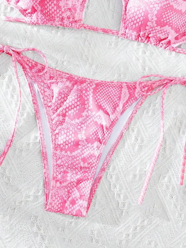 Close-up of bright pink snakeskin bikini bottom