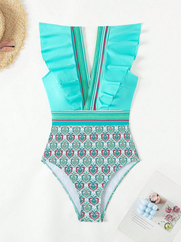 Flat lay of turquoise V-neck swimsuit