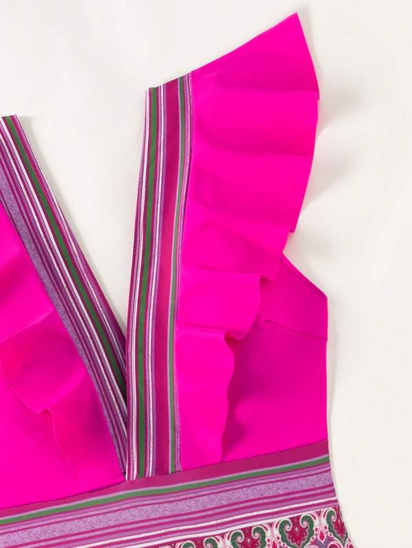 Close-up of pink swimsuit ruffles