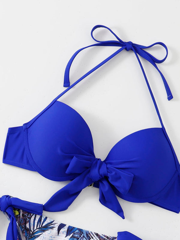 Close-up of blue bikini top with bow