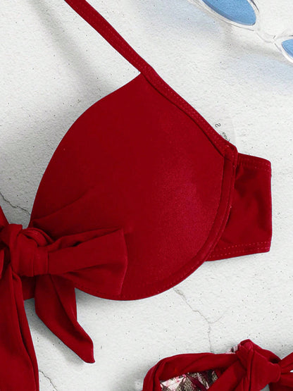 Close-up of red bikini top with bow