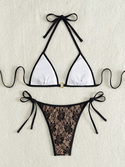Black lace halter top with floral pattern and nude bikini