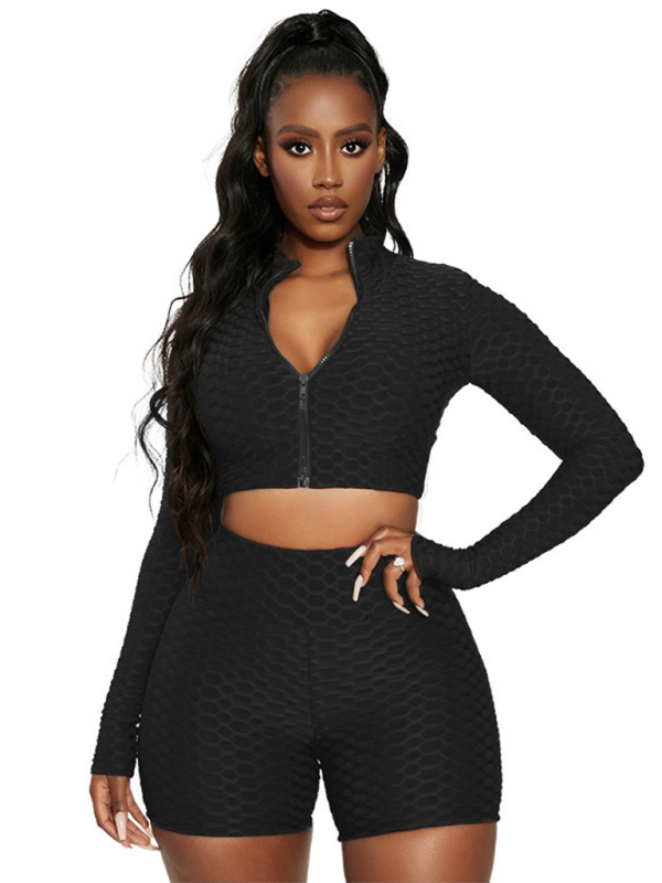 Black textured athleisure set with long sleeves and crop top