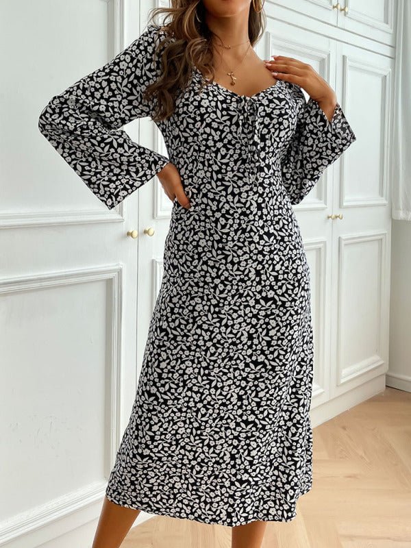 Damenkleid mit rückenfreiem Print und langen Ärmeln
