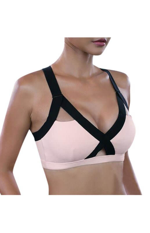 a woman wearing a bra with a black strap