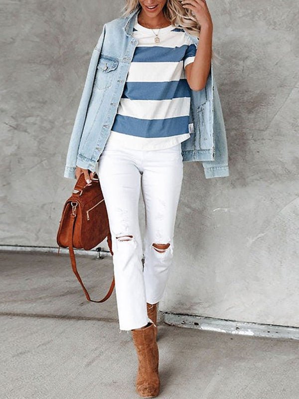 a woman in white jeans and a jean jacket