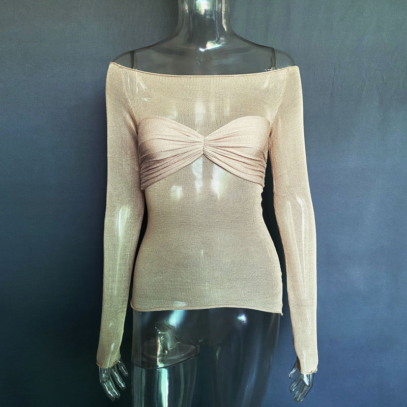 a mannequin wearing a top with a bow on it