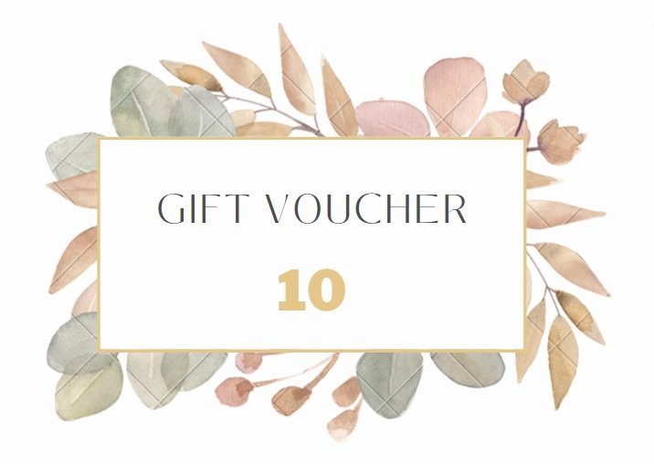 a gift voucher sign with leaves and branches