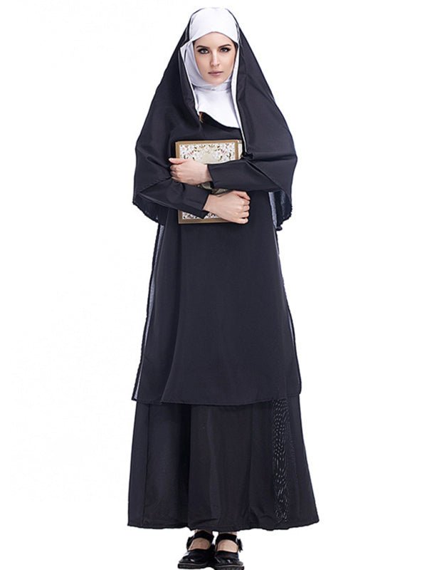 a woman in a nun outfit holding a book