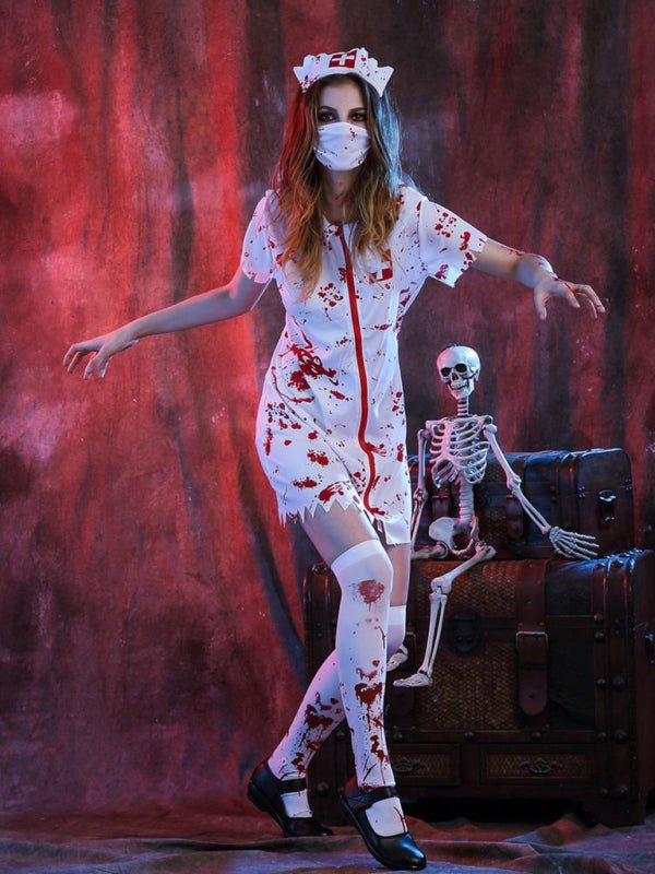 a woman dressed as a nurse standing next to a skeleton