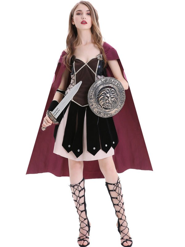 a woman dressed as a roman warrior holding a sword and shield