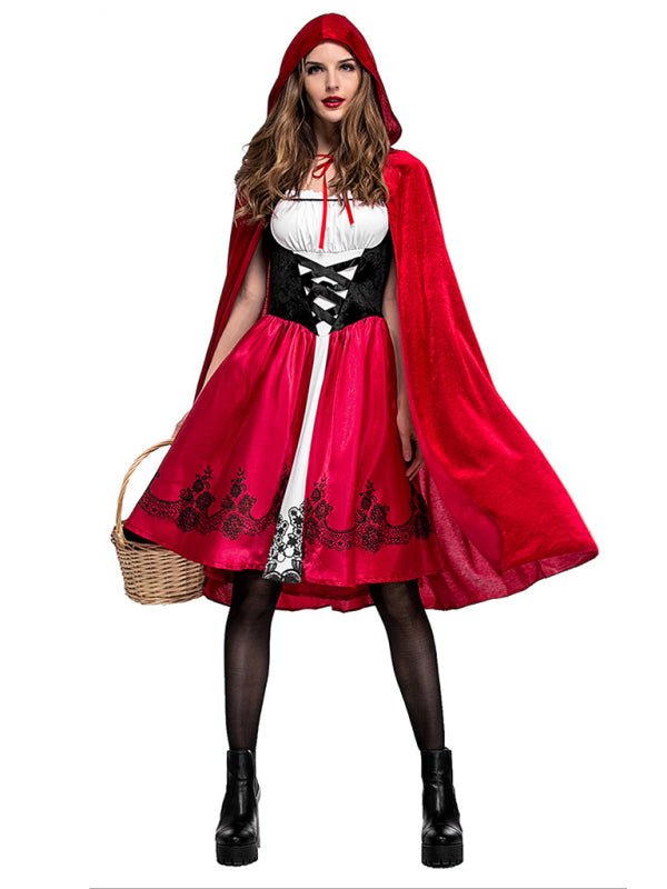 a woman dressed in a red riding hood and dress