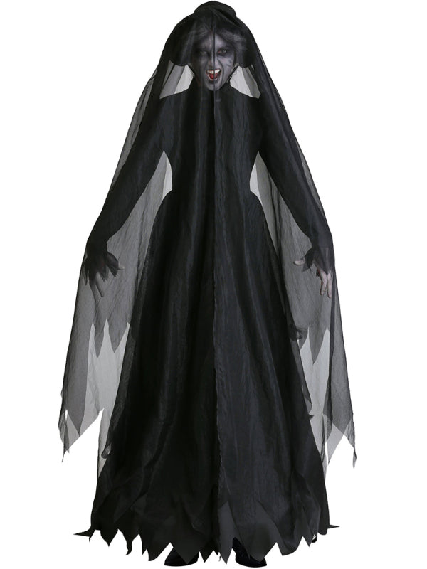 a woman wearing a black ghost costume