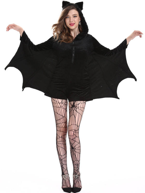 a woman wearing a black bat costume