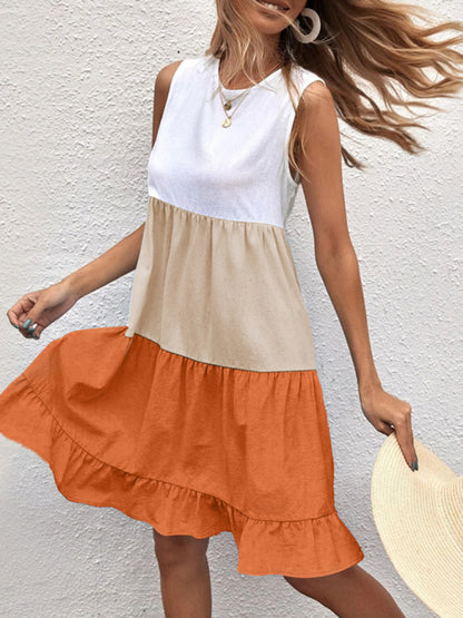 a woman in a dress and hat walking down a street