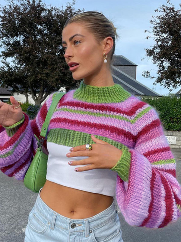 a woman in a pink and green striped sweater