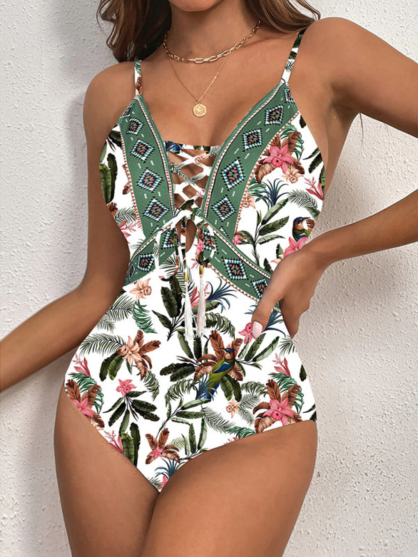 a woman in a floral print one piece swimsuit