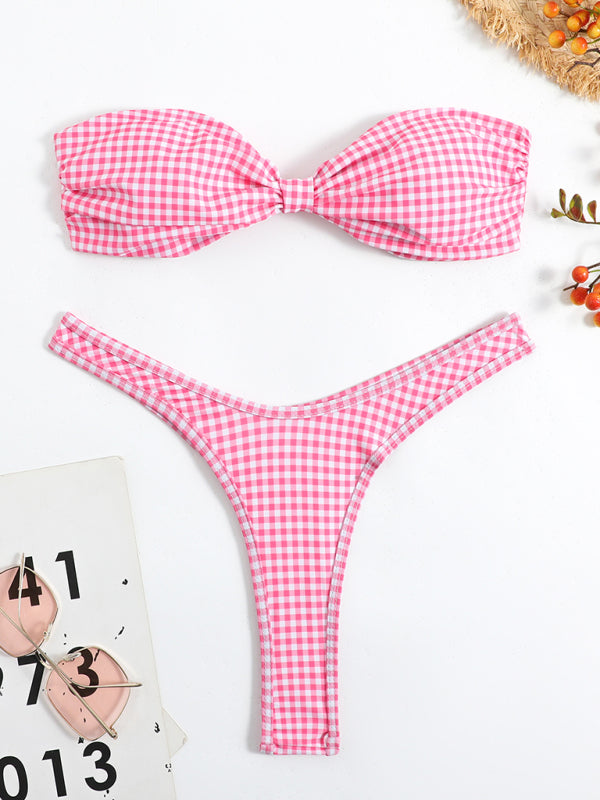 a pink and white gingham bikini with a bow tie