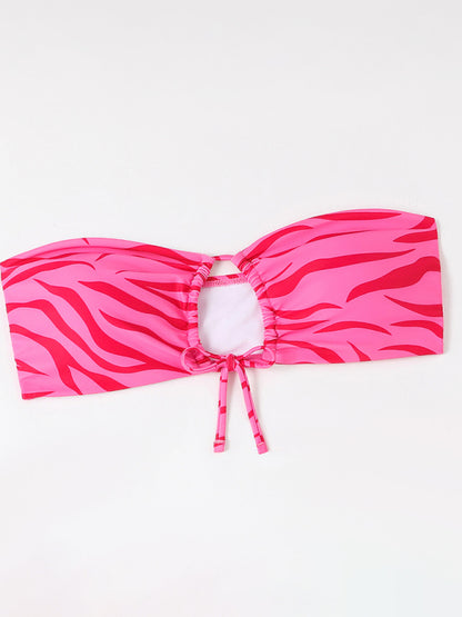 a pink and black zebra print headband