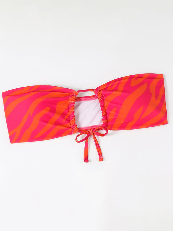 a pink and orange bikini top with ruffles
