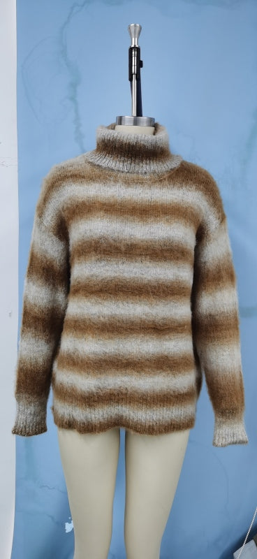 a mannequin wearing a brown and white striped sweater