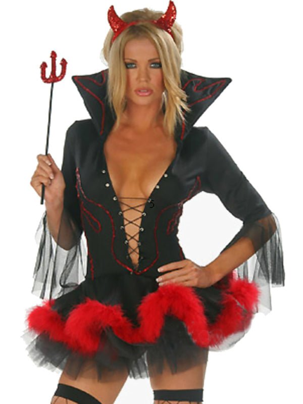 a woman dressed in a devil costume