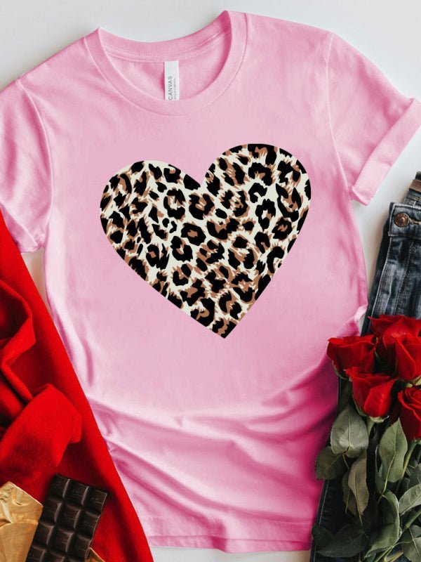 a pink shirt with a leopard print heart
