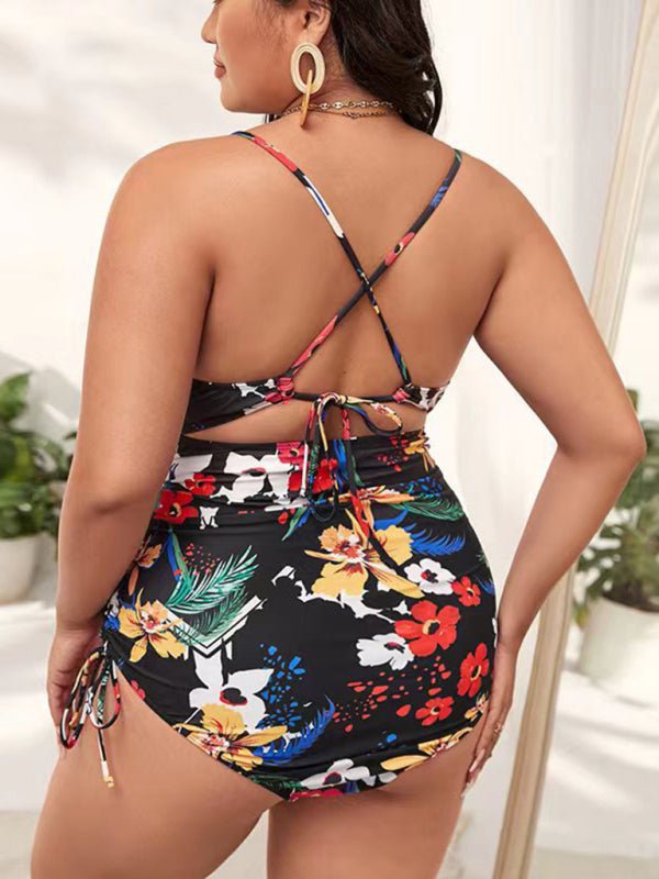 a woman in a floral print one piece swimsuit