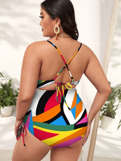 a woman in a multicolored one piece swimsuit