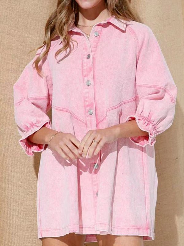 a woman wearing a pink shirt dress