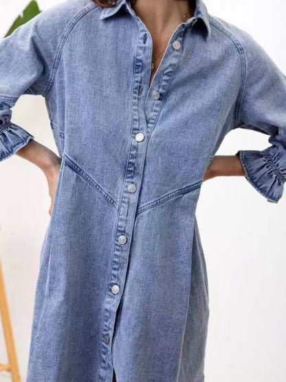 a woman wearing a denim shirt dress with ruffle sleeves