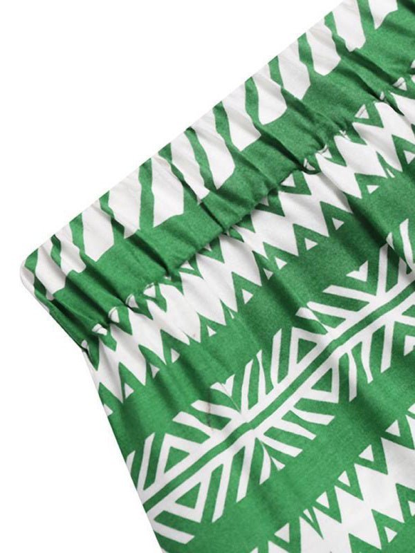 a close up of a green and white blanket