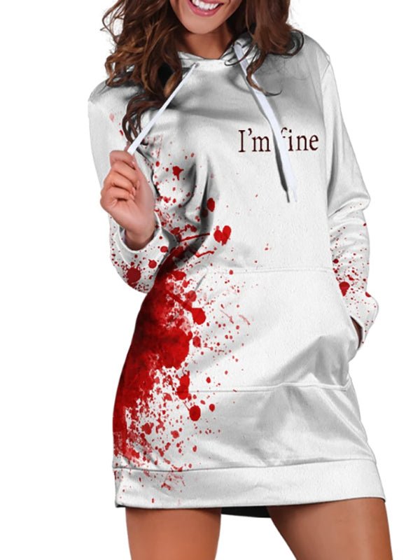 a woman wearing a white hoodie with red paint splattered on it