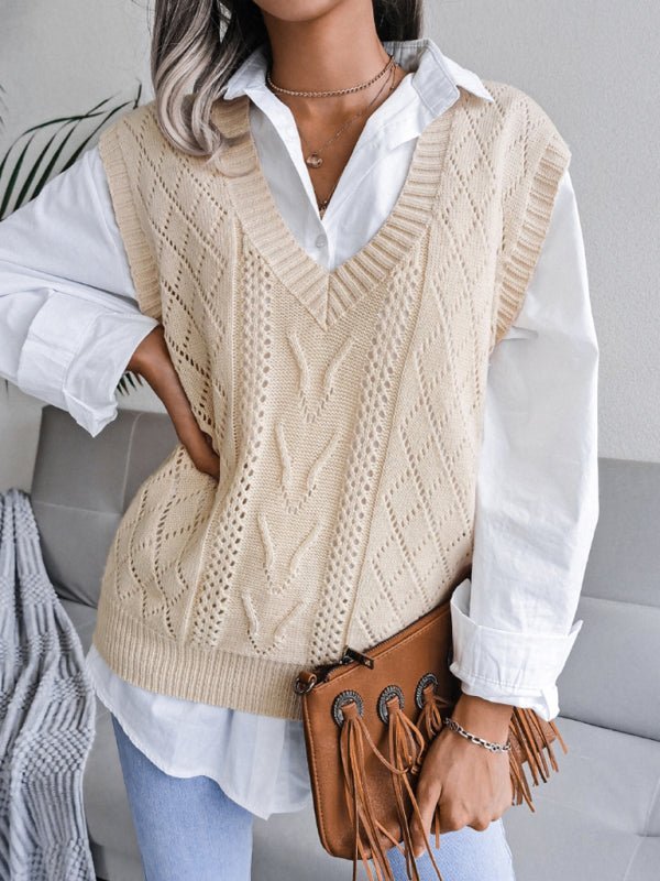 a woman wearing a white shirt and a beige sweater vest