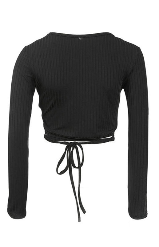 a cropped top with a tie around the waist