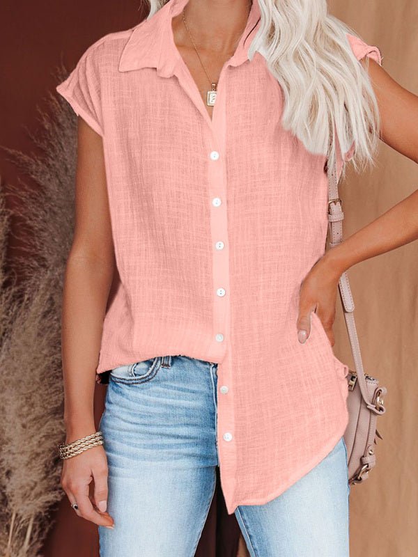 a woman wearing a pink shirt and jeans