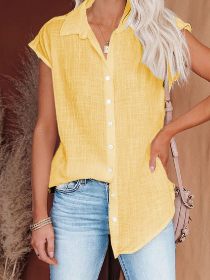 a woman wearing a yellow shirt and jeans